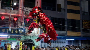 Chinese lion dance troupe shrugs off patriarchal past