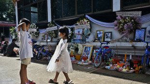 Families gather for mass cremation of Thai nursery victims