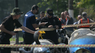 2 dead after small plane crashes in Sao Paulo street, hits bus