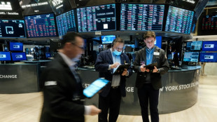 Global stocks end mostly up as demand worries weigh on oil prices