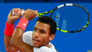 Canada's Auger-Aliassime battles to seventh ATP title